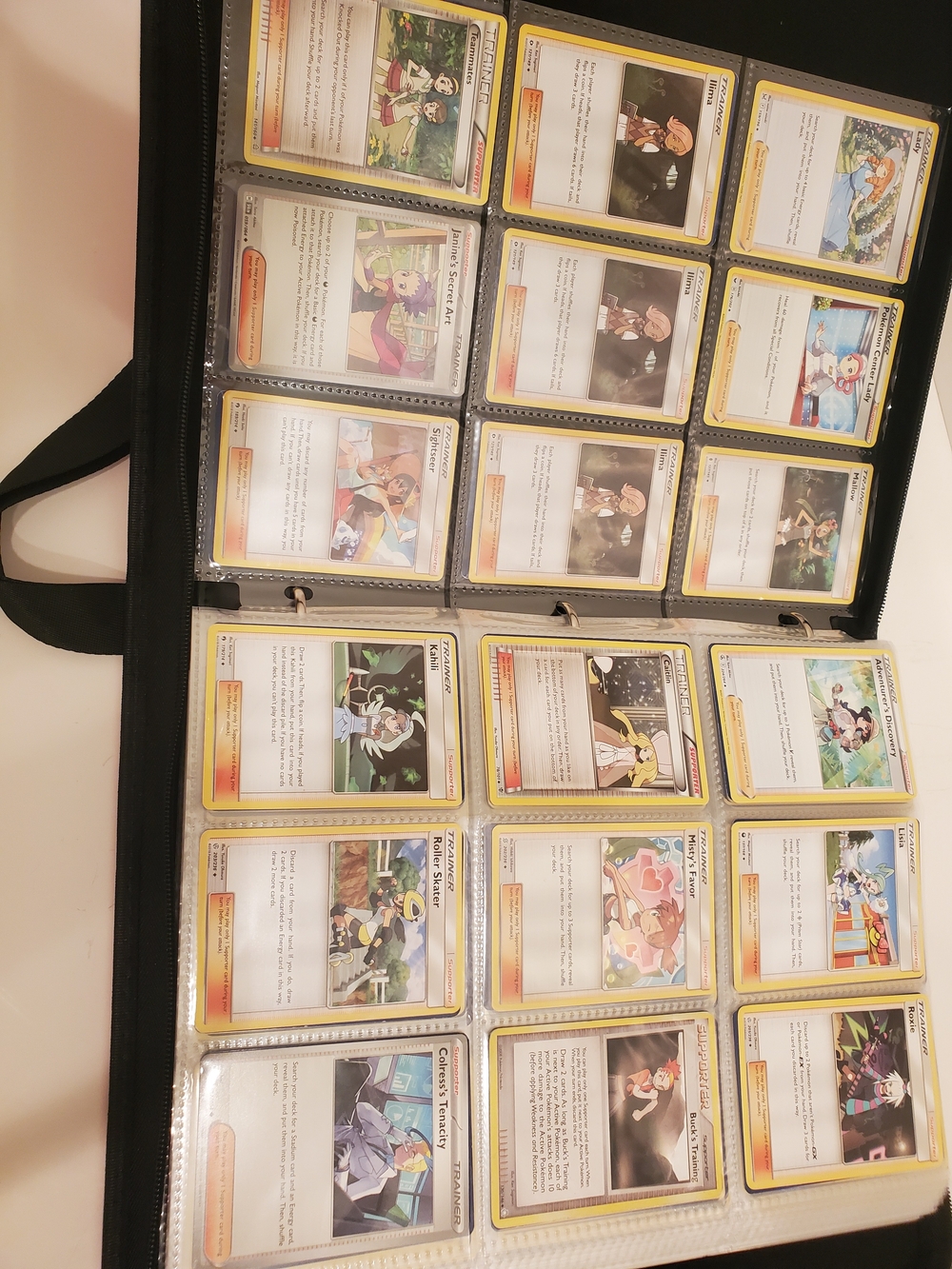 Pokemon Trainer Cards Collection in Black Binder - Yellow Accents
